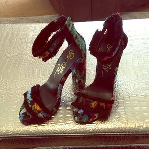 Black floral embroidered heels with ankle strap